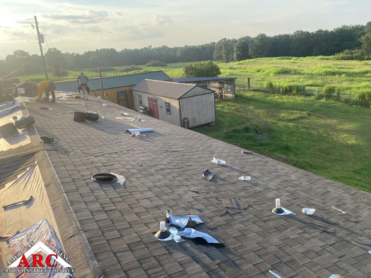 Metal roof remove install 30 year shingle